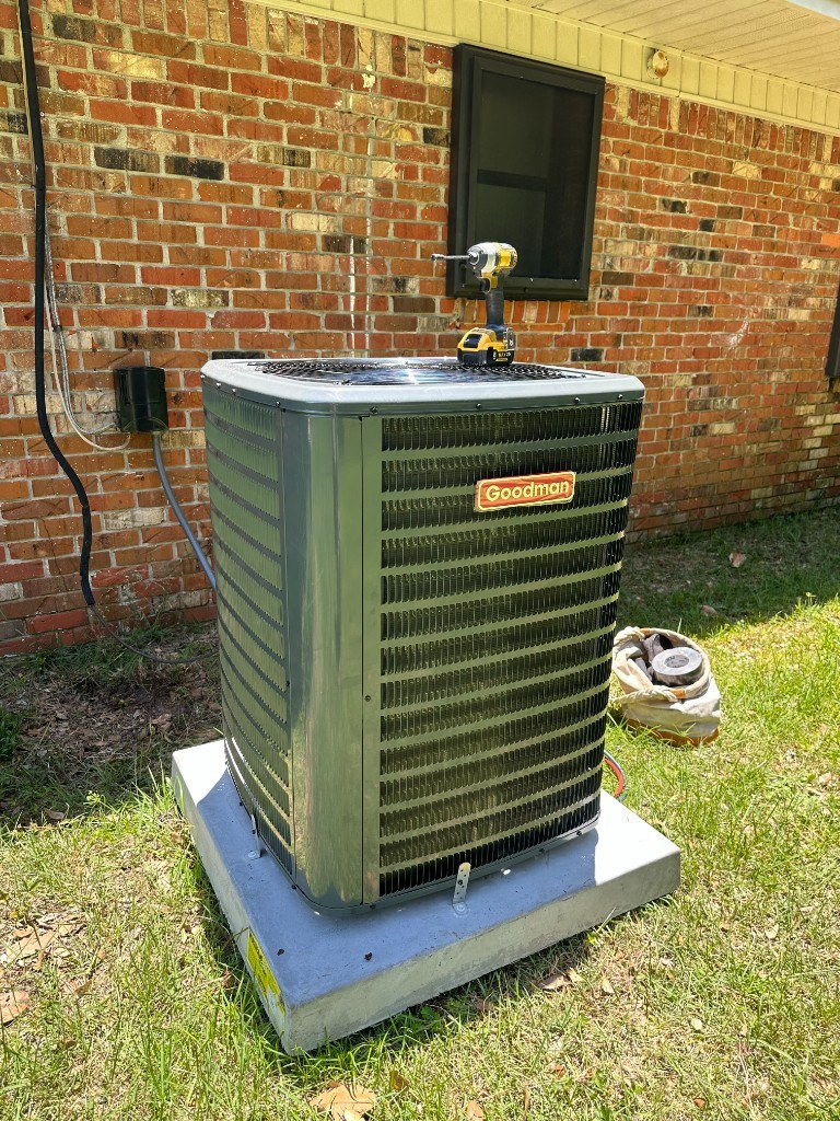 New Goodman condenser on a pad during residential install — Affordable Air Service