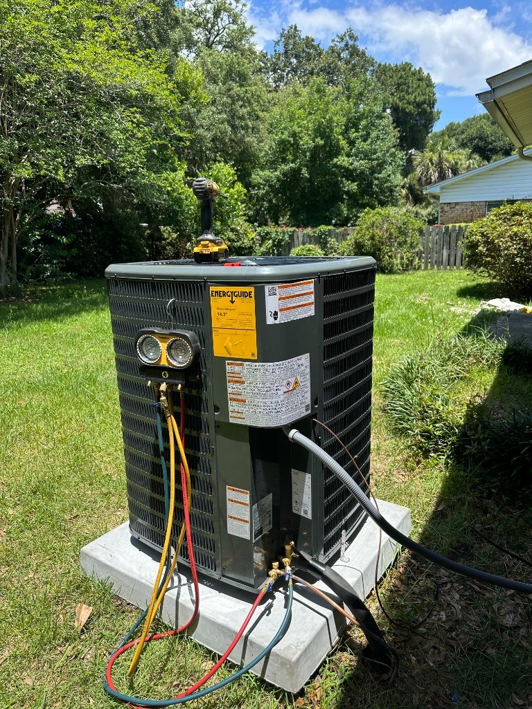 Outdoor condenser with manifold gauges during service — Affordable Air Service
