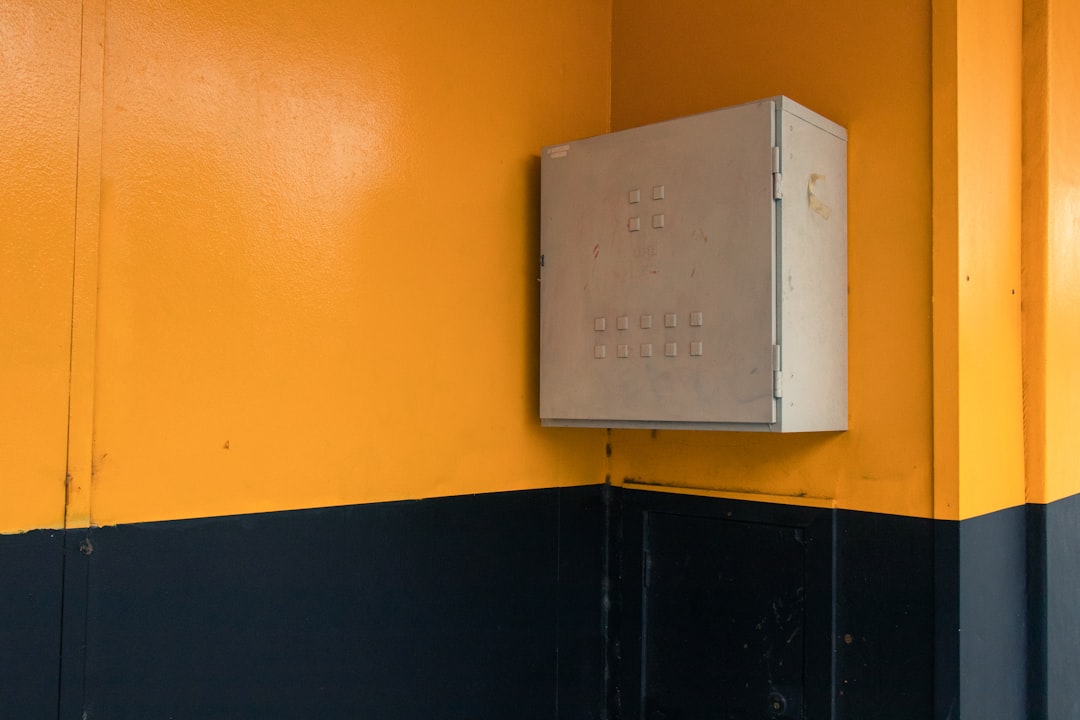 Blog 2 tankless water heater mounted on wall in modern home utility room
