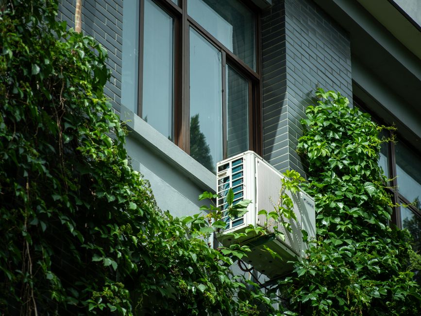 Blog 4 coastal home with outdoor AC unit on the Gulf Coast, humid salt air environment